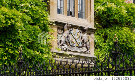 Ornate Crest and Lush Ivy Adorning Corpus Christi College, Cambridge Ornate Crest and Lush Ivy Adorning Corpus Christi College, Cambridge 132655053