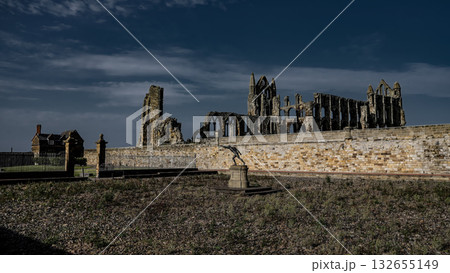 Whitby Abbey dominating the landscape in North York Moors National Park, UK 132655149