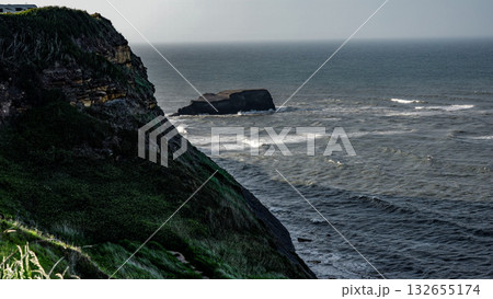 Dramatic cliff overlooking the North Sea near Whitby in North York Moors National Park Dramatic cliff overlooking the North Sea near Whitby in North York Moors National Park 132655174