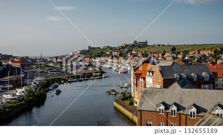 Whitby harbor with boats and Saint Mary s Church on a sunny summer day 132655189