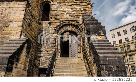 Newcastle Castle keep entrance with stairs and partially open wooden door Newcastle Castle keep entrance with stairs and partially open wooden door 132655223