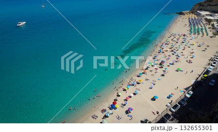 Tourists relaxing on the beach at Tropea, Calabria, Italy 132655301