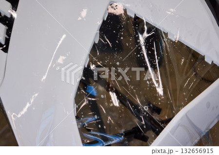 Applying a Protective Film on the Surface of Your Car for Enhanced Durability and Shine 132656915