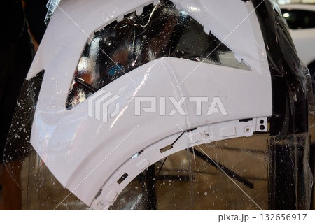 Applying a Protective Film on the Surface of Your Car for Enhanced Durability and Shine 132656917