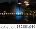 nighttime Supertree Grove Gardens by the Bay blue fountain glowing lights 132661049