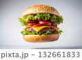 Appetizing cheeseburger hanging in the air on a white background 132661833
