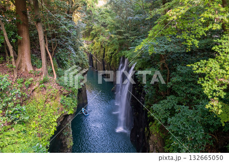 Boats at Takachiho gorge and Manai waterfall at sunrise, Miyazaki Boats at Takachiho gorge and Manai waterfall at sunrise, Miyazaki 132665050