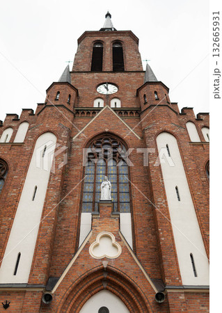 The Historic Brick Church features a Tower and a captivating Statue that attracts visitors 132665931