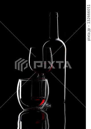 Still life with glass objects on a black background 132666051