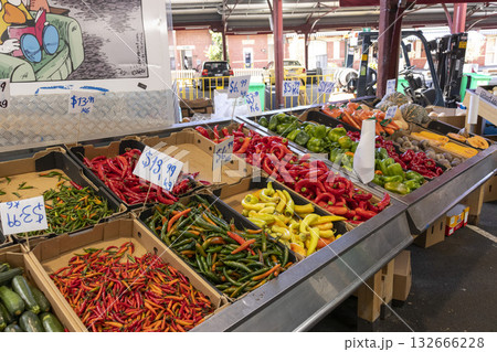 Melbourne, Australia - December 28,2023 : Fruits and vegetable vender at Queen Victoria Market in Melbourne, Australia on December 28,2023. Melbourne, Australia - December 28,2023 : Fruits and vegetable vender at Queen Victoria Market in Melbourne, Australia on December 28,2023. 132666228