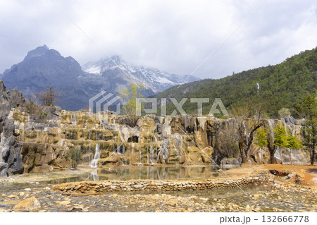 Lijiang, China - April 10, 2024 : Crowd of tourist travel at Blue Moon Valley lake in Lijiang, China on April 10, 2024. 132666778