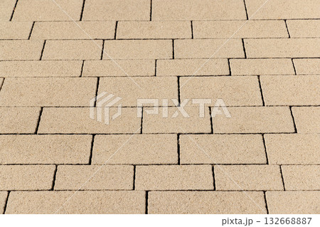 Tile texture on a pedestrian sidewalk with geometric pattern Tile texture on a pedestrian sidewalk with geometric pattern 132668887