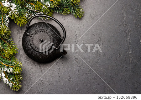 Christmas tea setting with teapot and fir tree branches 132668896