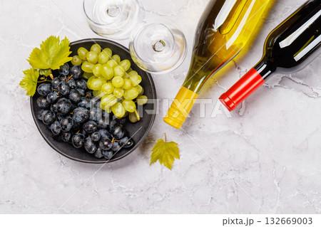 Wine bottles and fresh grapes Wine bottles and fresh grapes 132669003
