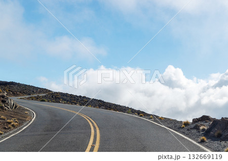 Mountain road above the clouds with scenic views Mountain road above the clouds with scenic views 132669119