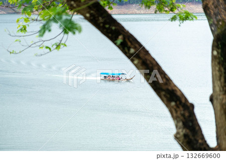 Tourist Boat Cruising on Lake in Thailand 132669600