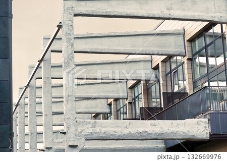 Brutalist Concrete Building Facade with Angular Geometric Architecture Brutalist Concrete Building Facade with Angular Geometric Architecture 132669976