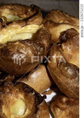 Close up of home make Yorkshire pudding roasted batter for Sunday roast dinner Close up of home make Yorkshire pudding roasted batter for Sunday roast dinner 132671215