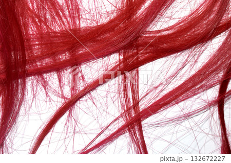 Bright red hair strands swirls on white background Bright red hair strands swirls on white background 132672227