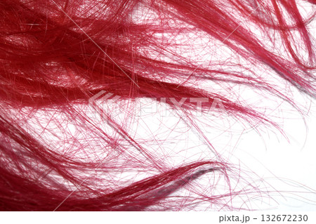Bright red hair strands swirls on white background 132672230