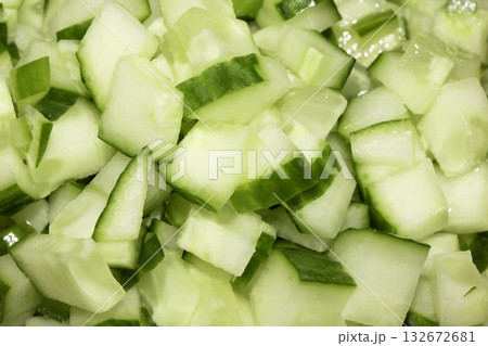Close up of sliced chopped cucumber pieces 132672681