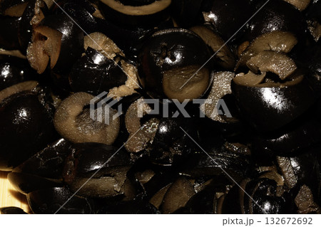Close up of chopped sliced black olives Close up of chopped sliced black olives 132672692