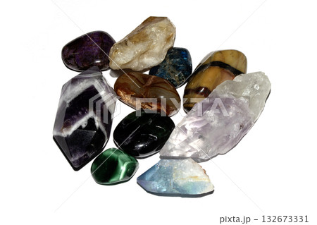 Close up of a healing crystal quartz rock stone on white background 132673331
