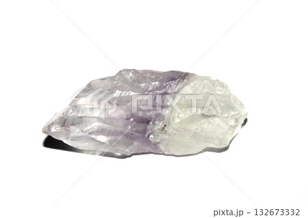 Close up of a healing crystal quartz rock stone on white background Close up of a healing crystal quartz rock stone on white background 132673332