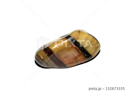 Close up of a healing crystal quartz rock stone on white background 132673335