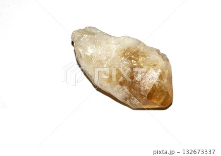 Close up of a healing crystal quartz rock stone on white background 132673337