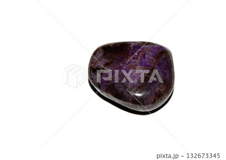 Close up of a healing crystal quartz rock stone on white background 132673345