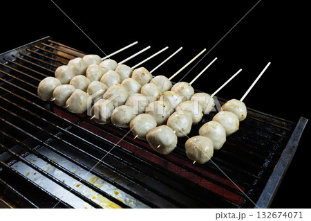 Top view of meat ball Skewer on black isolated, focus selective 132674071