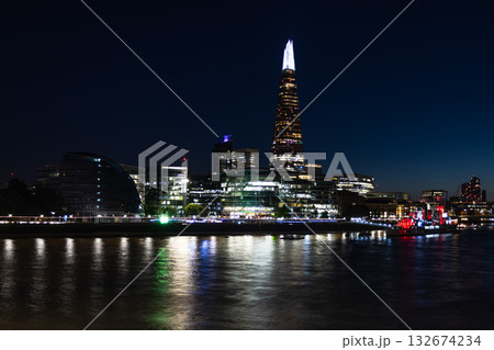 The Shard and London skyline at night over the River Thames 132674234