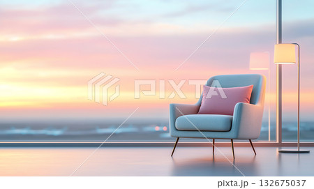 cozy armchair with pink cushion beside lamp, overlooking sunset 132675037