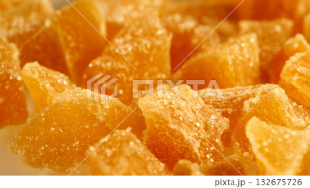 Crystallized candied ginger pieces close up Crystallized candied ginger pieces close up 132675726