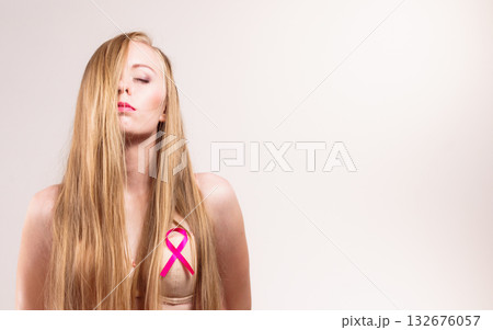 Woman chest in bra, pink cancer ribbon 132676057