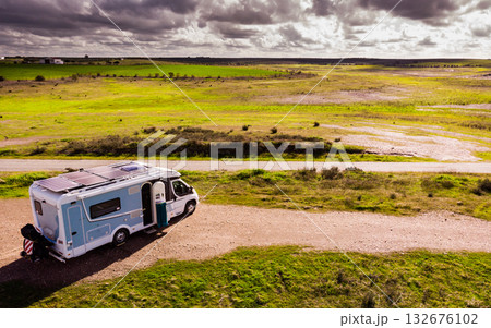 Caravan solar panels on roof camping on nature. Aerial view 132676102