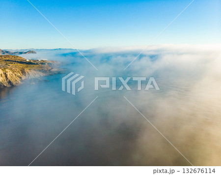 Sea with morning fog over water. 132676114