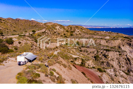 Caravan camping on cliff sea shore Caravan camping on cliff sea shore 132676115