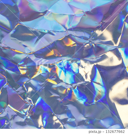 Abstract iridescent foil texture with rainbow shine for vibrant modern design and background Abstract iridescent foil texture with rainbow shine for vibrant modern design and background 132677662