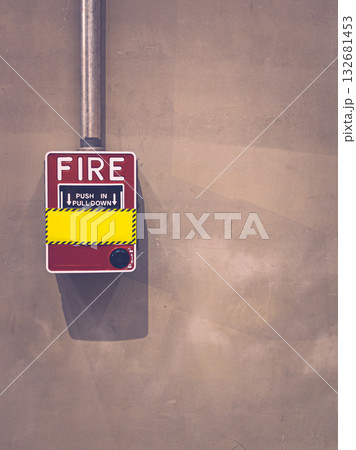 Red fire alarm on concrete wall in modern industrial interior. 132681453