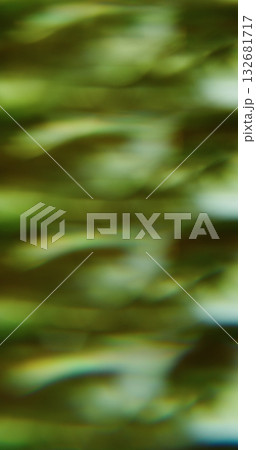 Blur line leak. Prism effect glow. Yellow fractal striping luminescent pattern on dark abstract background golden color art ray effect. Blur line leak. Prism effect glow. Yellow fractal striping luminescent pattern on dark abstract background golden color art ray effect. 132681717