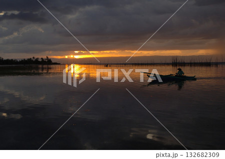 Sunset with fishing boat, at Panglao Island, Philippines Sunset with fishing boat, at Panglao Island, Philippines 132682309