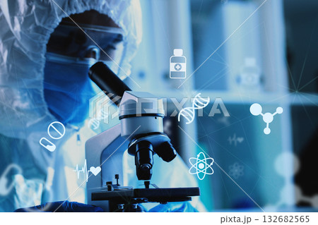 Scientist examining samples with a microscope in a laboratory during research activities 132682565