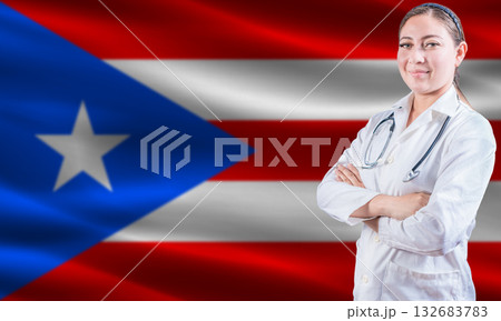 Female doctor on Puerto Rico flag. Doctor with crossed arms on Puerto Rico flag. Puerto Rican health and care concept Female doctor on Puerto Rico flag. Doctor with crossed arms on Puerto Rico flag. Puerto Rican health and care concept 132683783