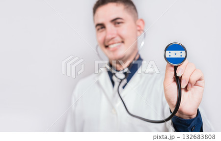 Doctor showing stethoscope with Honduras flag. Honduras national healthcare concept 132683808