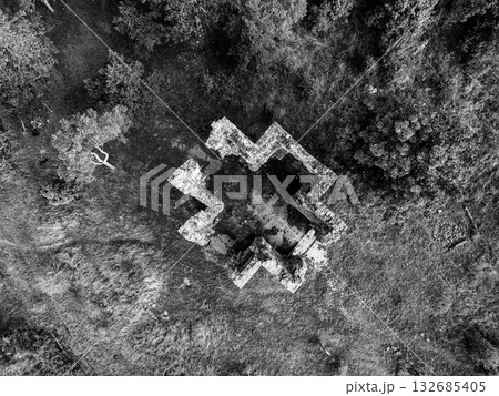 Drone view of the Chapel of the Exaltation of the Holy Cross ruins in Bristev. Surrounded by nature, the structure’s remains provide a glimpse into the past and evoke a sense of history. Drone view of the Chapel of the Exaltation of the Holy Cross ruins in Bristev. Surrounded by nature, the structure’s remains provide a glimpse into the past and evoke a sense of history. 132685405
