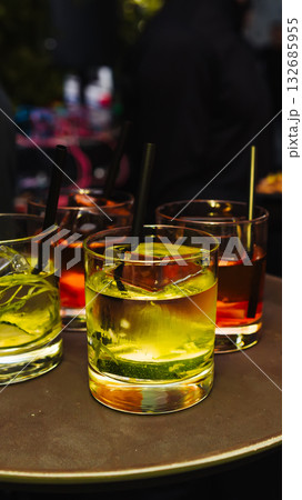 A server with cocktails at an event. A server with cocktails at an event. 132685955