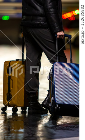 A traveler with colorful luggage. A traveler with colorful luggage. 132685982