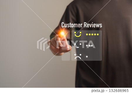 Customer touching the virtual screen on the happy smile face icon to give satisfaction in service. Customer service, online reviews, rating very impressed, testimonial and customer satisfaction. Customer touching the virtual screen on the happy smile face icon to give satisfaction in service. Customer service, online reviews, rating very impressed, testimonial and customer satisfaction. 132686965